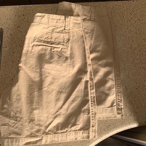 Two pairs of Tan Gap Shorts.